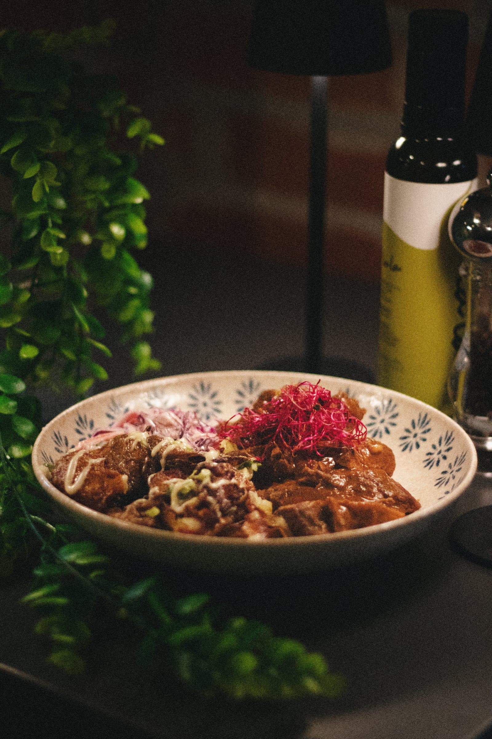 Hearty stew bowl with beetroot sprouts